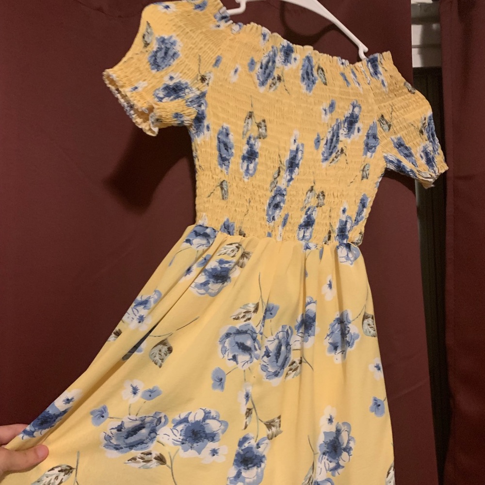 A floral romper. - Picture 2 of 3